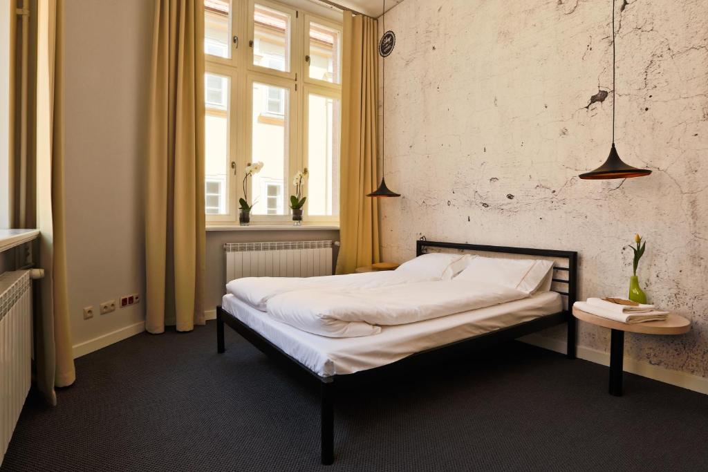 Posteľ alebo postele v izbe v ubytovaní Sleep in Hostel & Apartments Stary Rynek