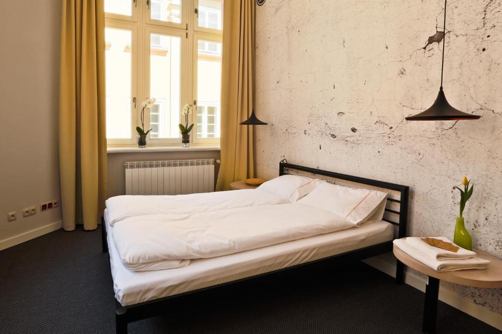 Posteľ alebo postele v izbe v ubytovaní Sleep in Hostel & Apartments Stary Rynek