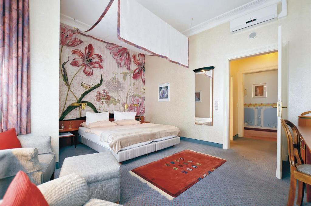 Postel nebo postele na pokoji v ubytování Hotel Jugendstil