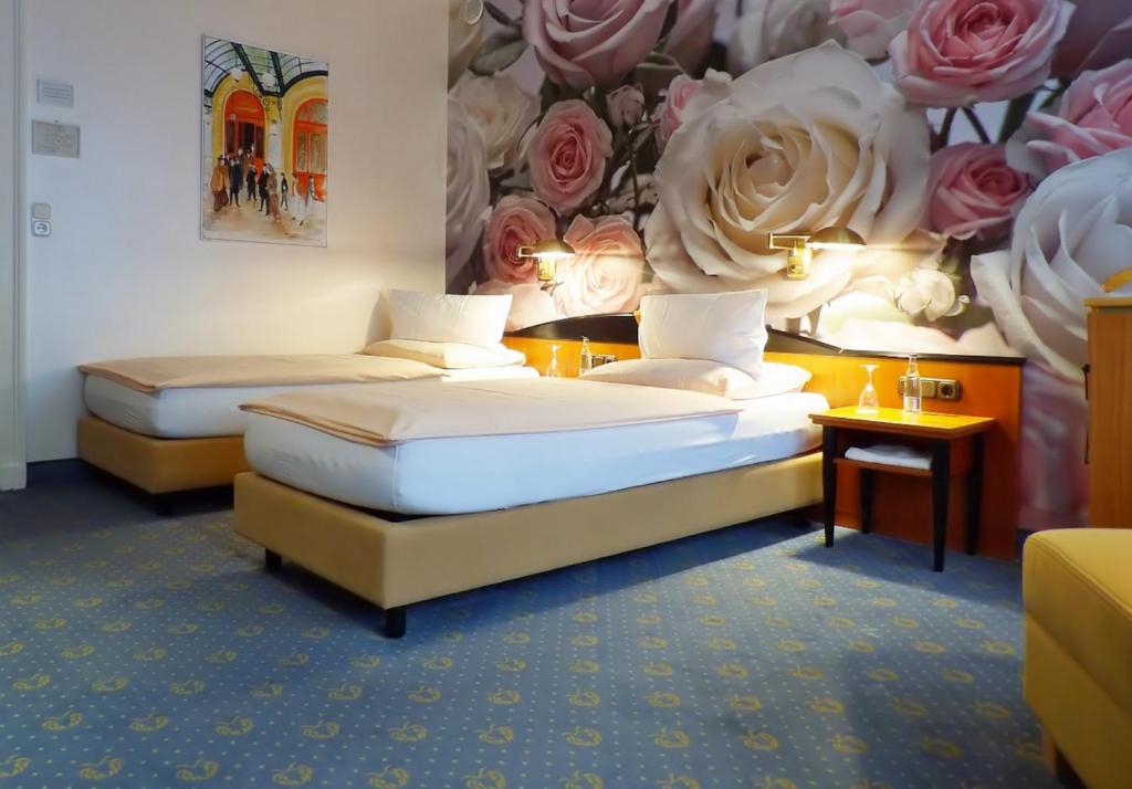 Postel nebo postele na pokoji v ubytování Hotel Jugendstil