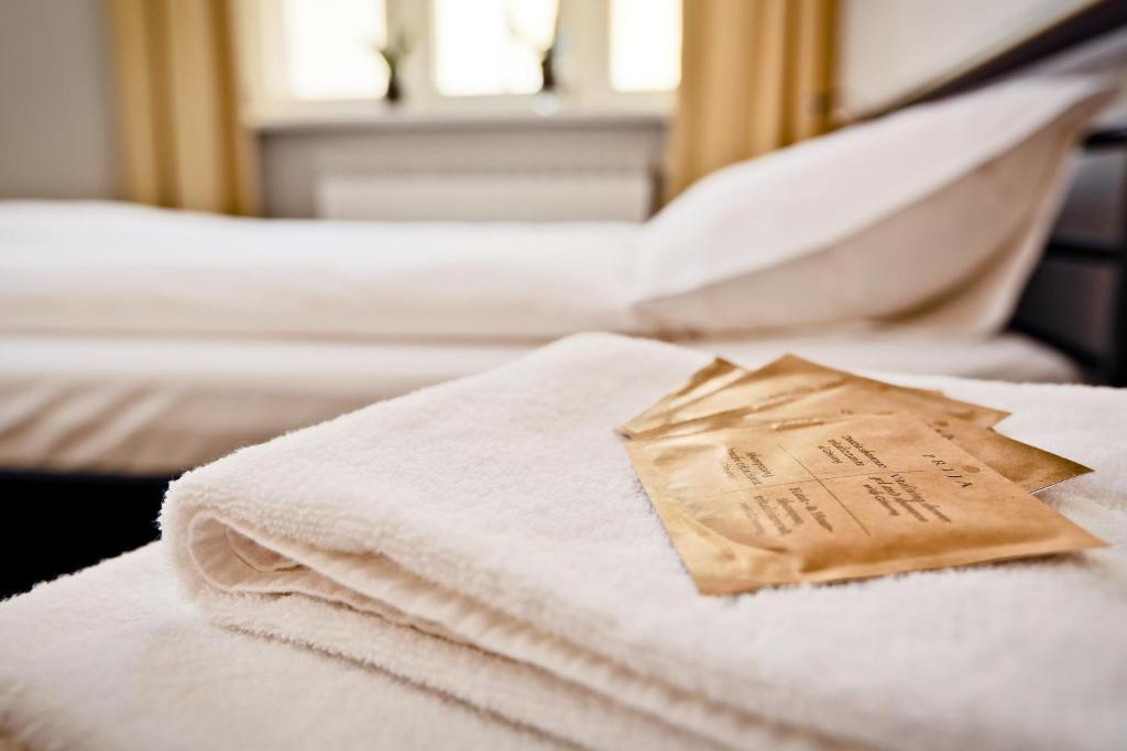 Posteľ alebo postele v izbe v ubytovaní Sleep in Hostel & Apartments Stary Rynek