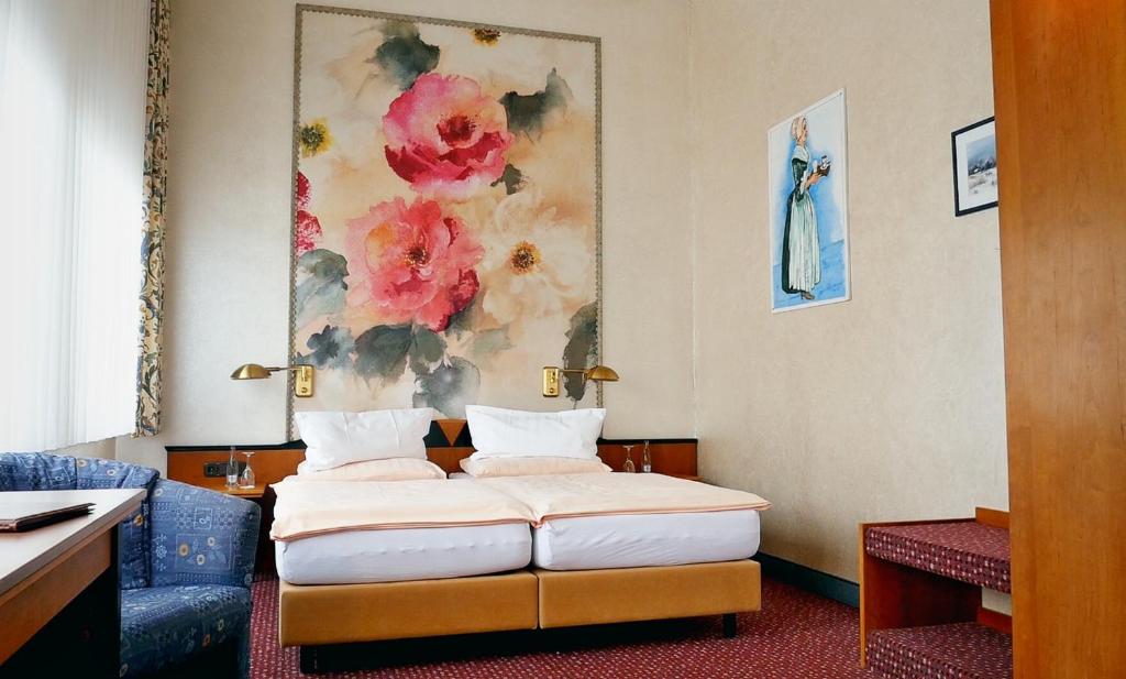 Postel nebo postele na pokoji v ubytování Hotel Jugendstil
