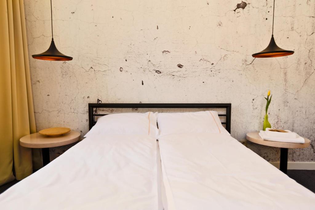 Posteľ alebo postele v izbe v ubytovaní Sleep in Hostel & Apartments Stary Rynek