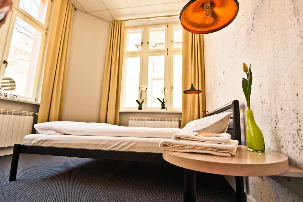Posteľ alebo postele v izbe v ubytovaní Sleep in Hostel & Apartments Stary Rynek