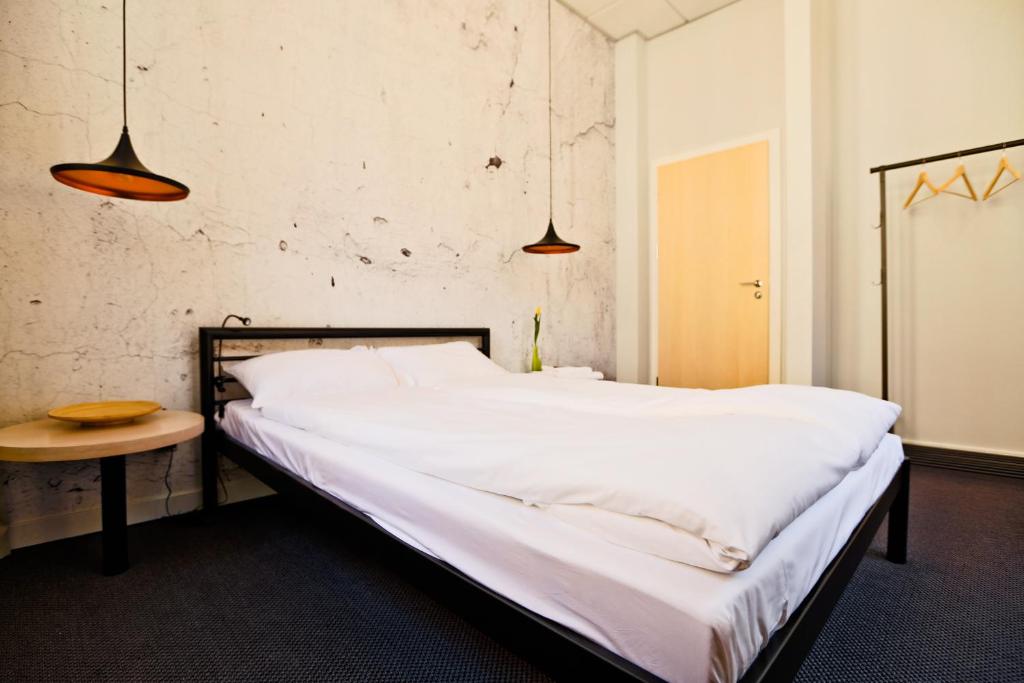 Posteľ alebo postele v izbe v ubytovaní Sleep in Hostel & Apartments Stary Rynek