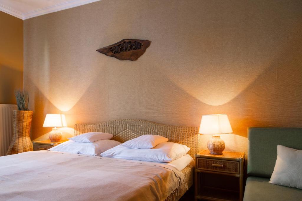 Postel nebo postele na pokoji v ubytování Hangya Panzió és Étterem