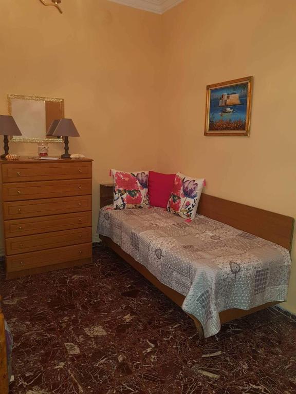 Posteľ alebo postele v izbe v ubytovaní Granny's home
