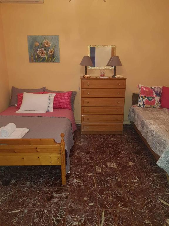Posteľ alebo postele v izbe v ubytovaní Granny's home