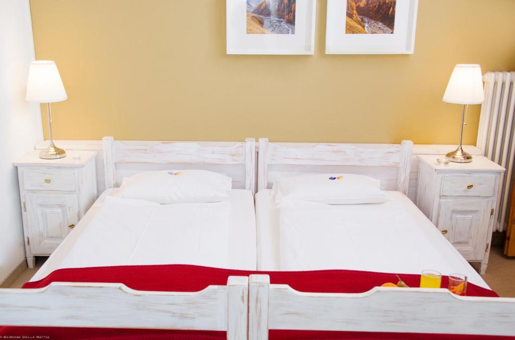 Postel nebo postele na pokoji v ubytování Hotel Veduta