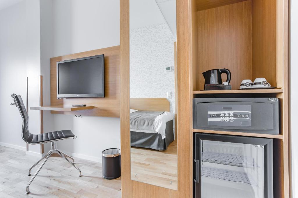 TV a/nebo společenská místnost v ubytování Hotel Spekeröd