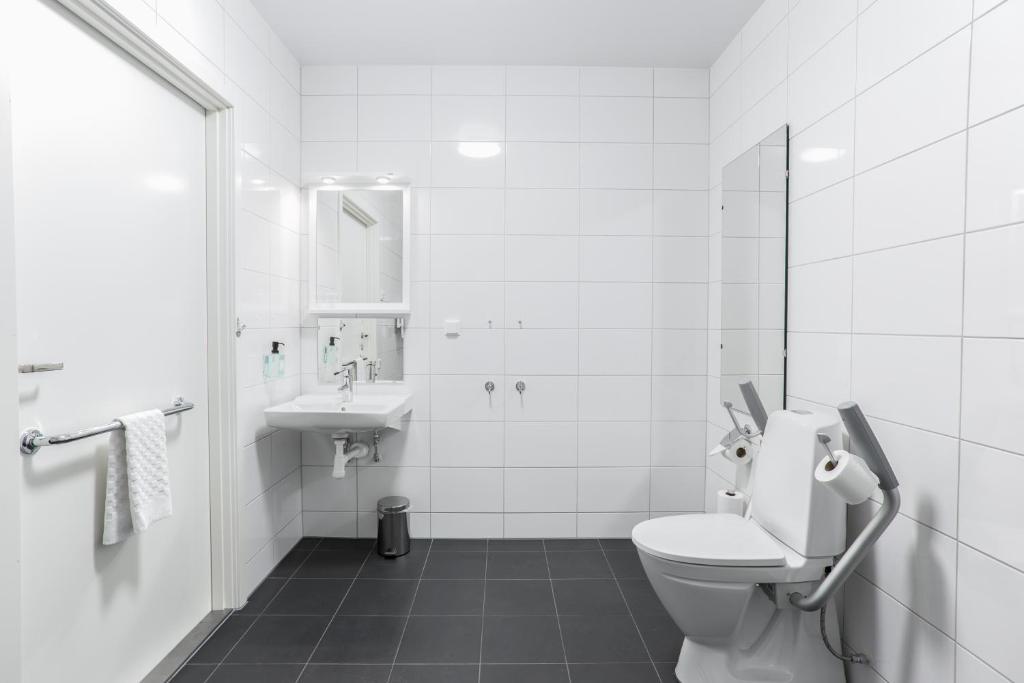 Koupelna v ubytování Hotel Spekeröd
