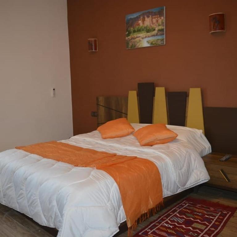 Postel nebo postele na pokoji v ubytování Maison d'hôtes Tinwitchi