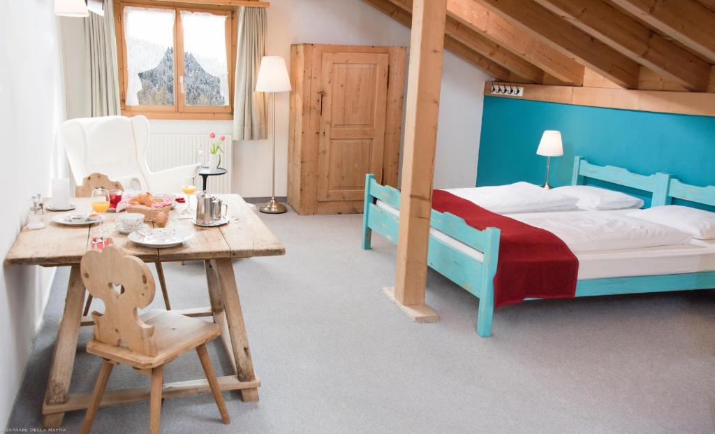 Postel nebo postele na pokoji v ubytování Hotel Veduta