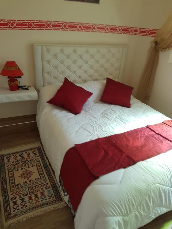 Postel nebo postele na pokoji v ubytování Maison d'hôtes Tinwitchi