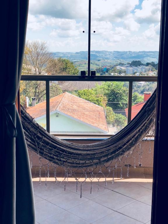  APARTAMENTO CENTRAL C/ VISTA PARA O VALE DOS VINHEDOS