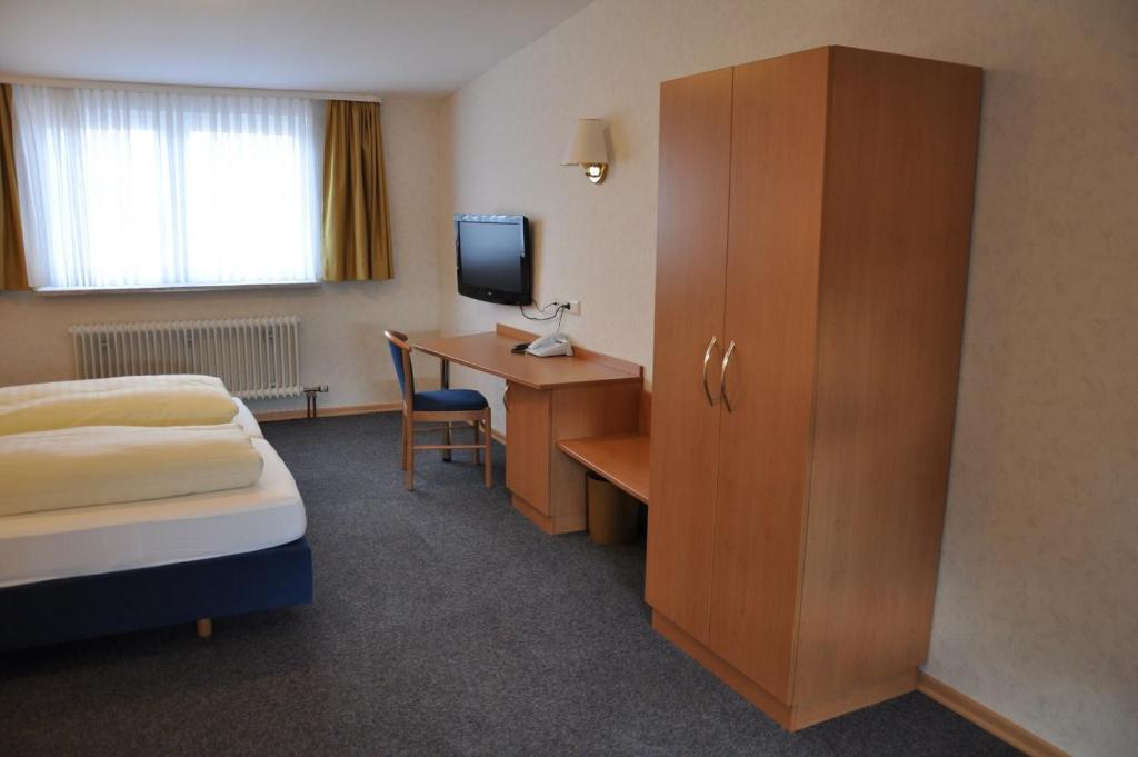 TV a/nebo společenská místnost v ubytování Hotel Bürgerhof