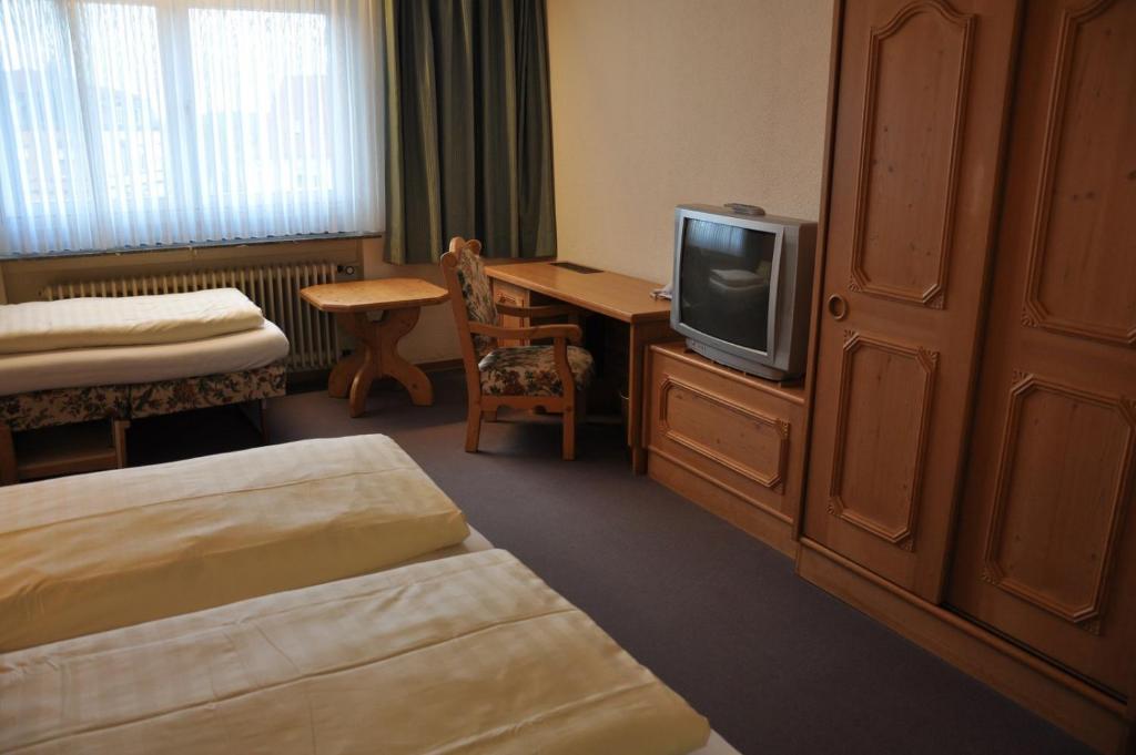 Postel nebo postele na pokoji v ubytování Hotel Bürgerhof