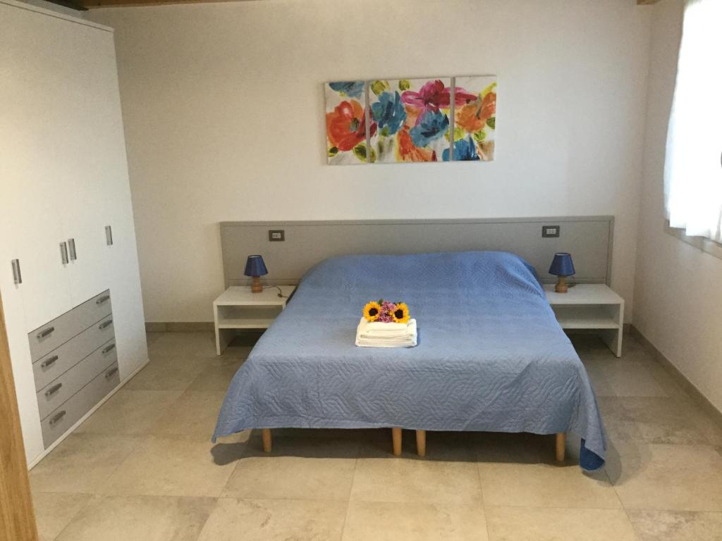Postel nebo postele na pokoji v ubytování Ca' Vittori
