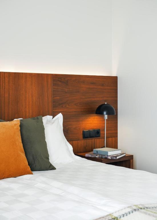 Letto o letti in una camera di Umi Hotel