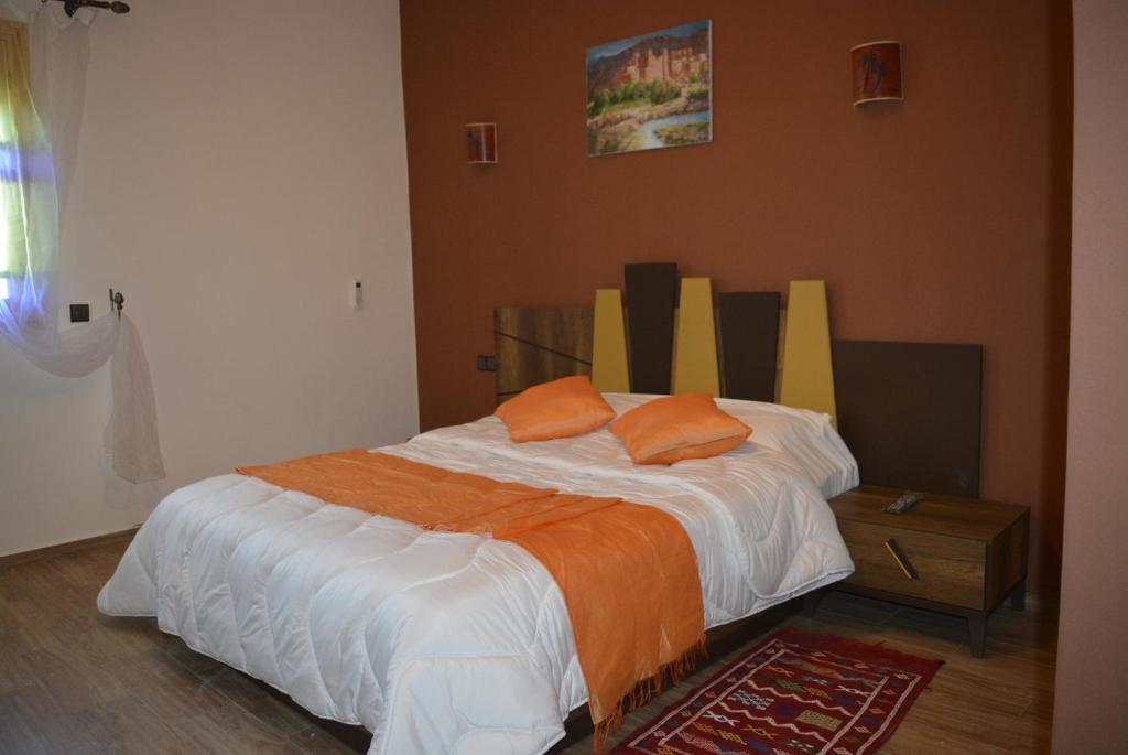 Postel nebo postele na pokoji v ubytování Maison d'hôtes Tinwitchi