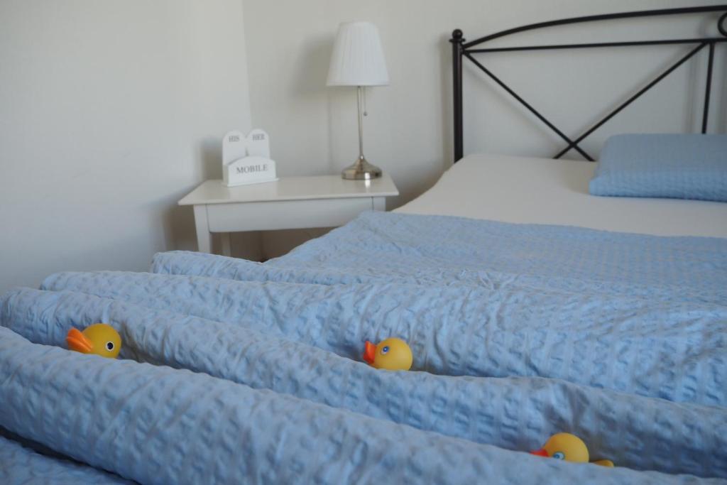 
Ein Bett oder Betten in einem Zimmer der Unterkunft BnB Entensee
