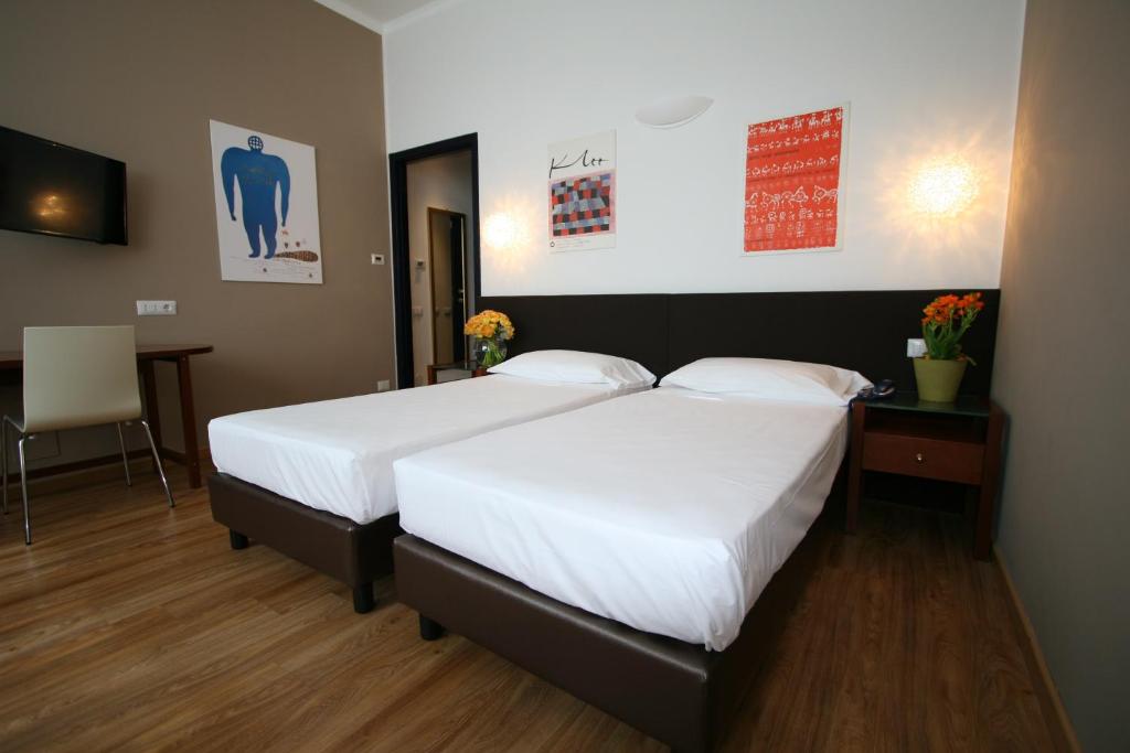 Postel nebo postele na pokoji v ubytování Hotel Oro Blu