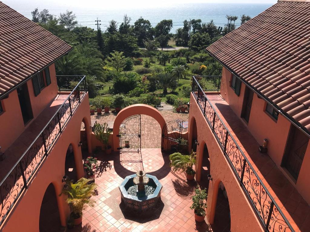 an overhead view of a courtyard with a fountain at Wishingwell B&amp;B in Donghe