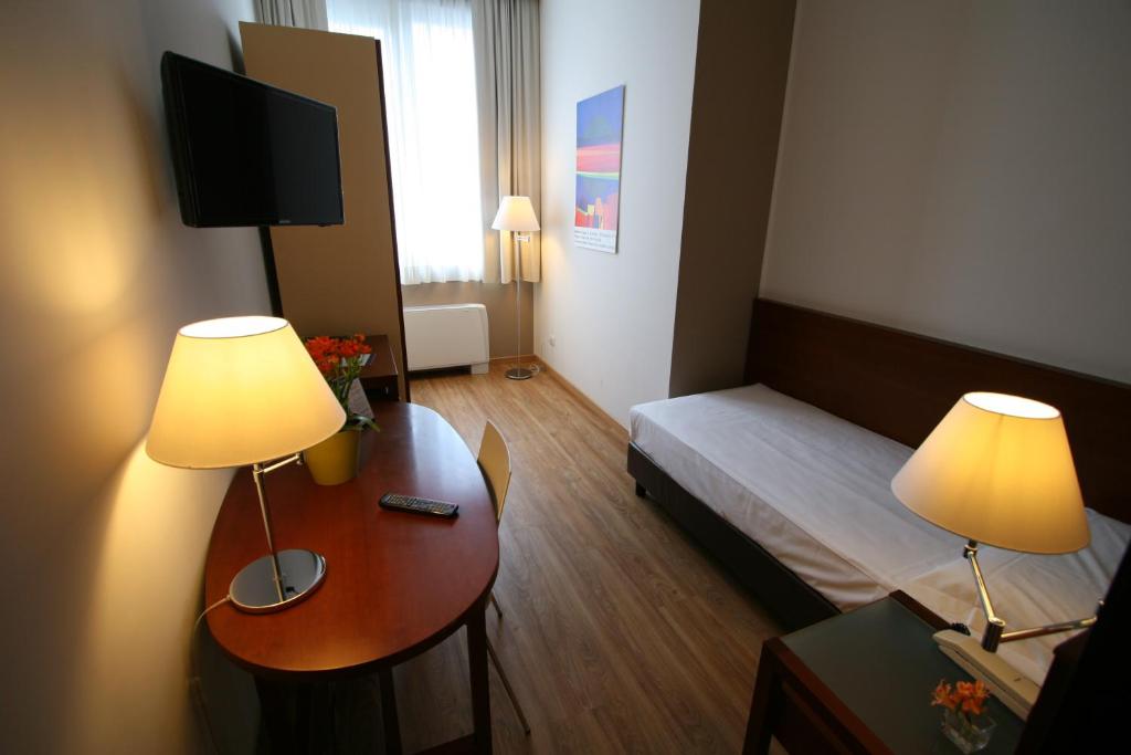 Postel nebo postele na pokoji v ubytování Hotel Oro Blu