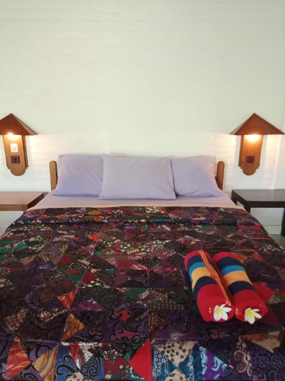 Postel nebo postele na pokoji v ubytování Rini hotel