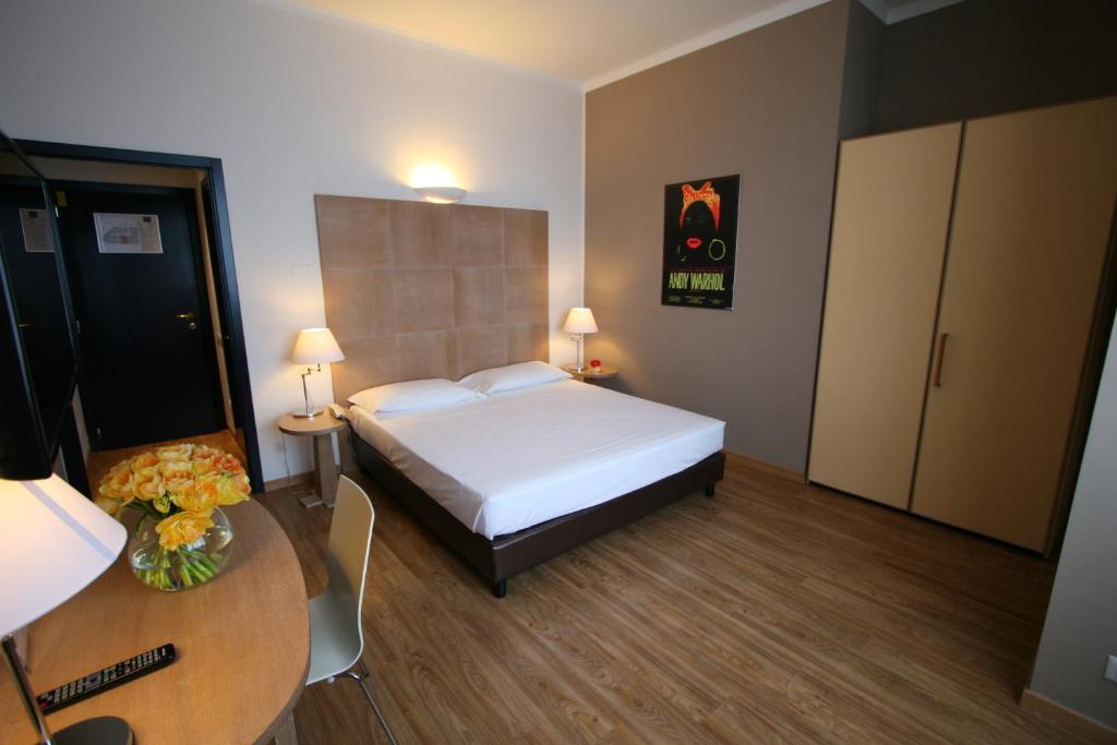 Postel nebo postele na pokoji v ubytování Hotel Oro Blu
