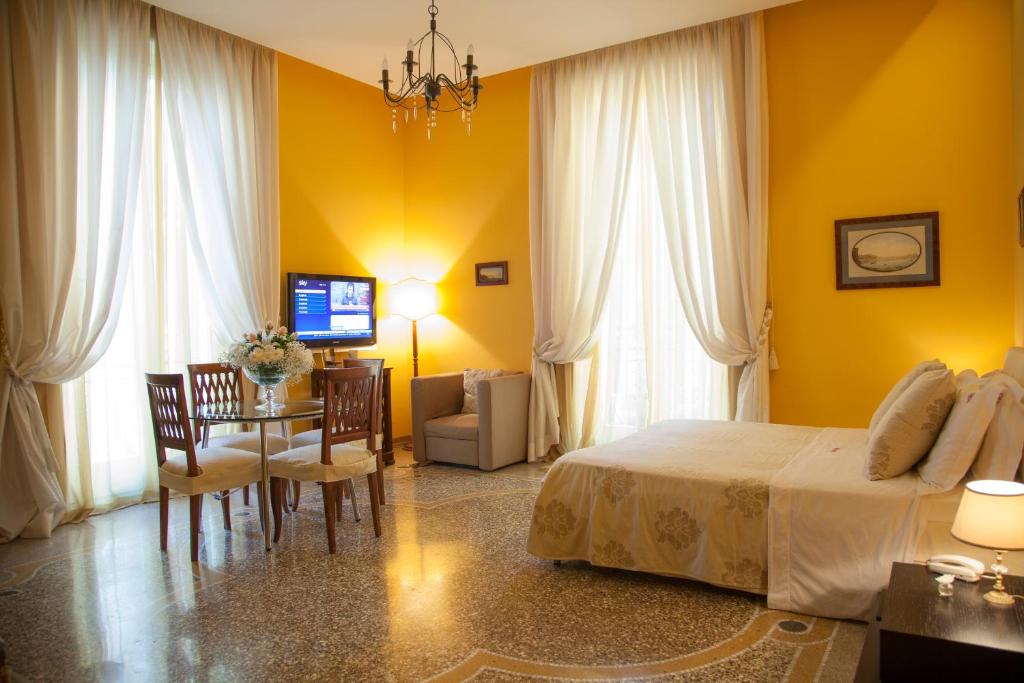 Posteľ alebo postele v izbe v ubytovaní B&B Orsini 46