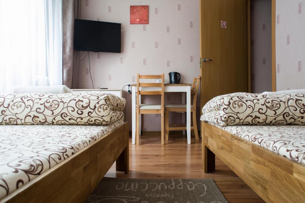 Postel nebo postele na pokoji v ubytování Savan House "Easy Kaunas"