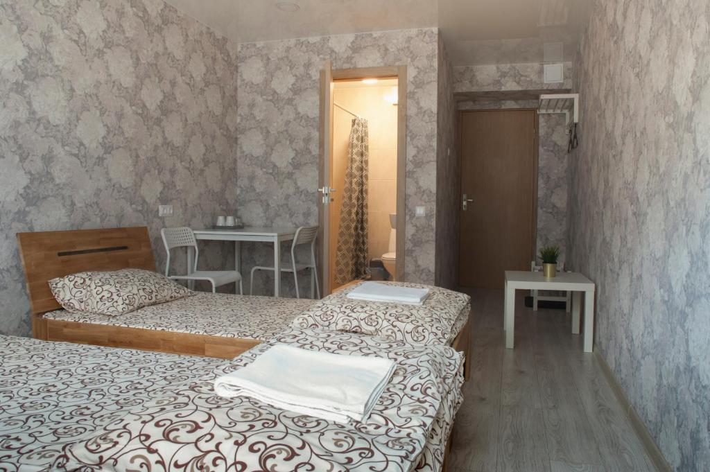 Postel nebo postele na pokoji v ubytování Savan House "Easy Kaunas"