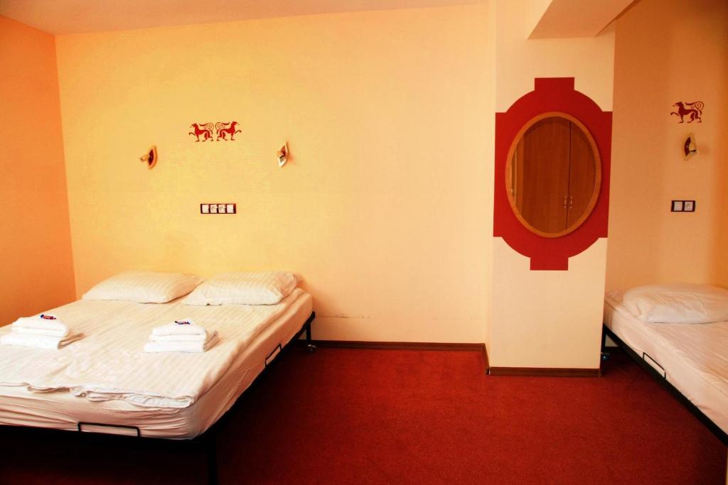 Postel nebo postele na pokoji v ubytování Willa Zuzanna