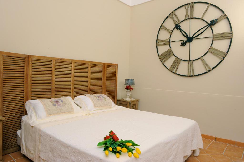 Postel nebo postele na pokoji v ubytování Maison Liparlati