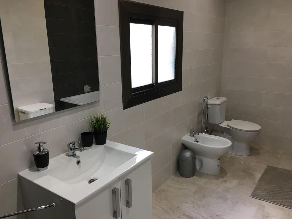 Kúpeľňa v ubytovaní Comfortable renovated flat, WiFi!