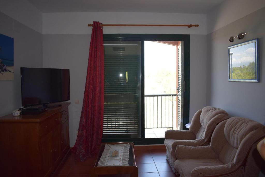 Televízia a/alebo spoločenská miestnosť v ubytovaní MSJ94 Bonito Apartamento en Marina Sant Jordi