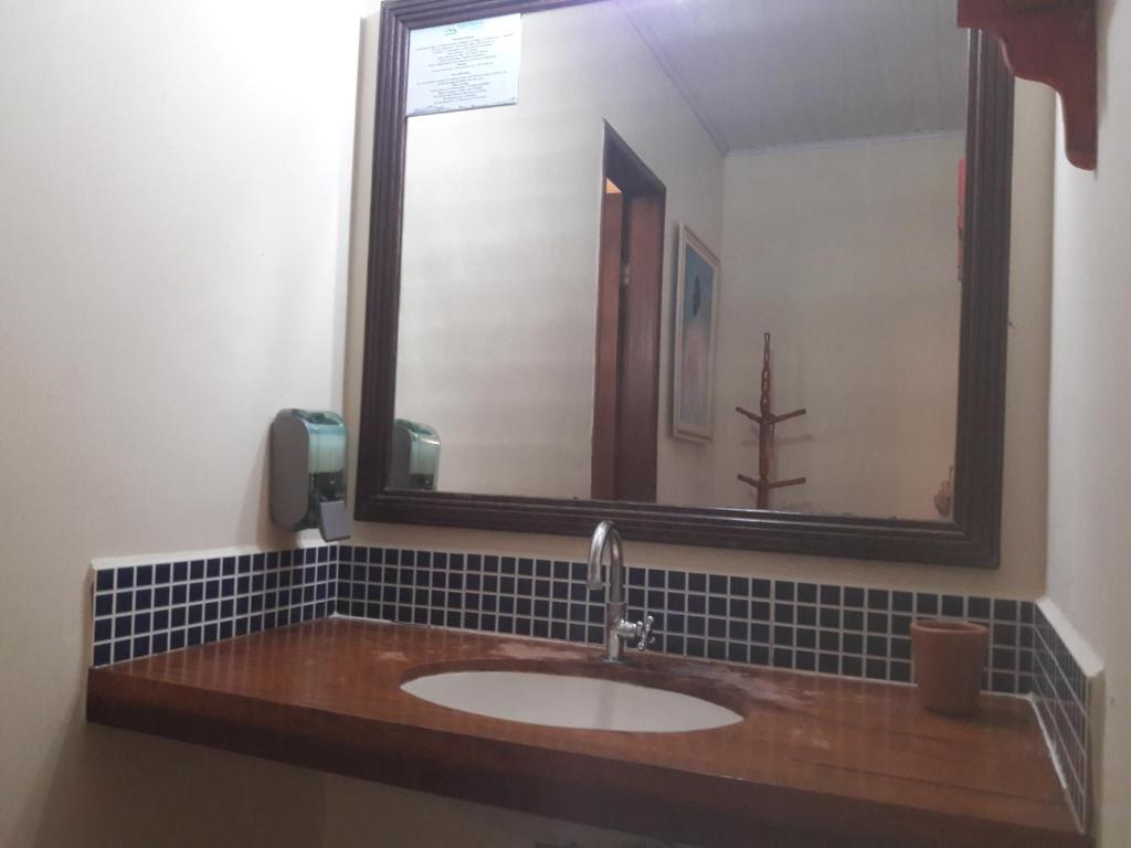 Um banheiro em Pousada Macunaima
