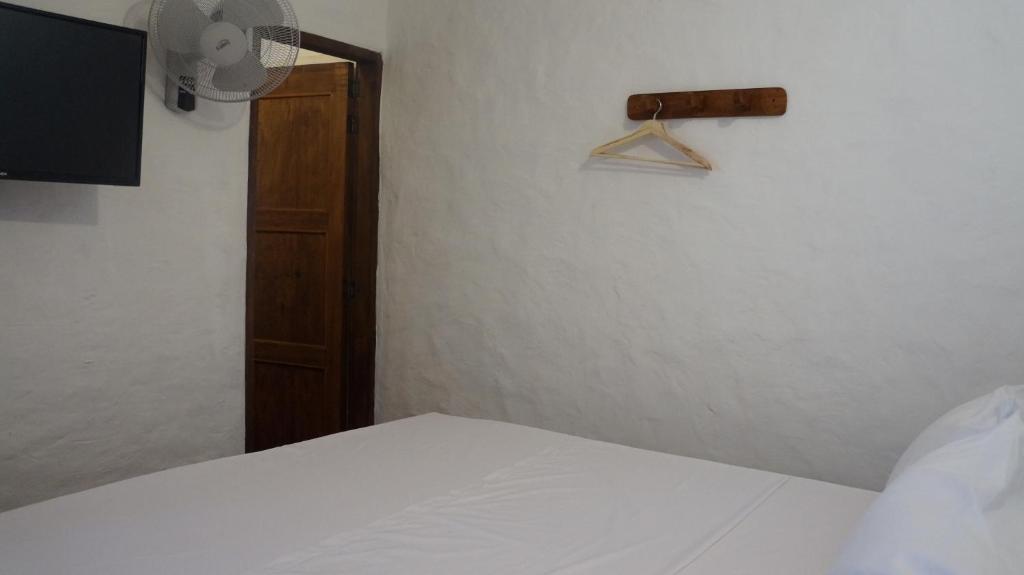 Llit o llits en una habitació de MONCOGUA Casa de Hospedaje