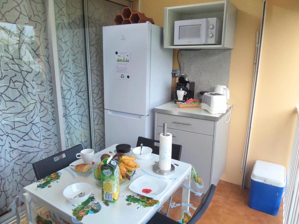 Kuchyň nebo kuchyňský kout v ubytování Caraïbes Holidays