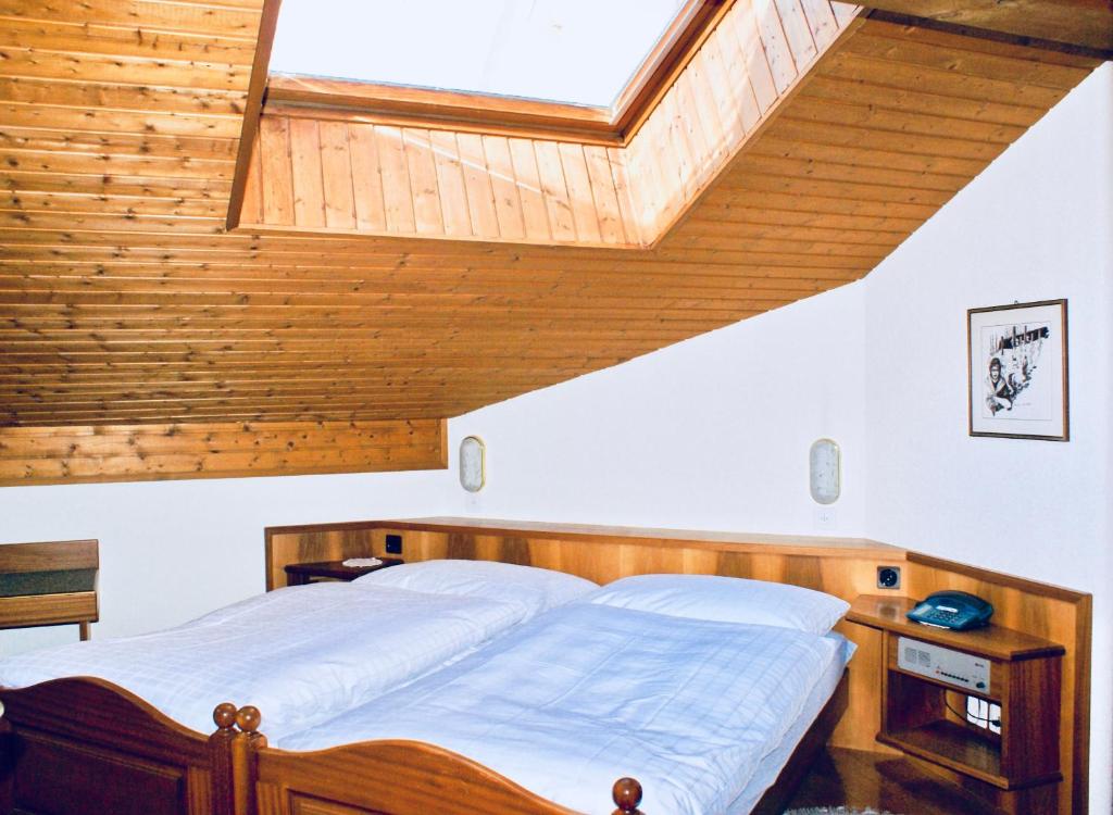 Postel nebo postele na pokoji v ubytování Hotel du Pont