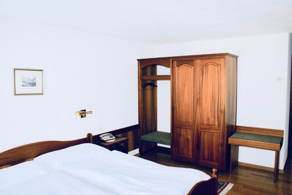 Postel nebo postele na pokoji v ubytování Hotel du Pont