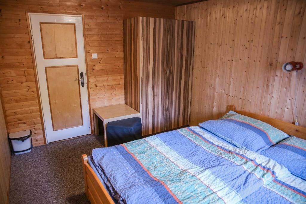Postel nebo postele na pokoji v ubytování Chata Bajama