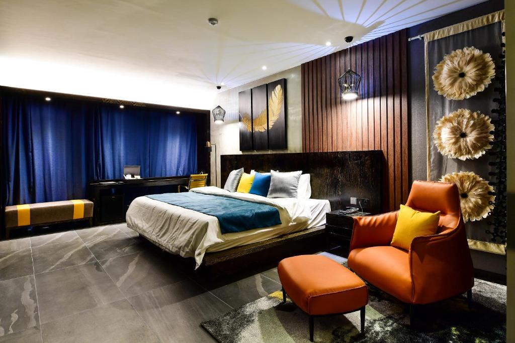 Postel nebo postele na pokoji v ubytování Hotel Ritz