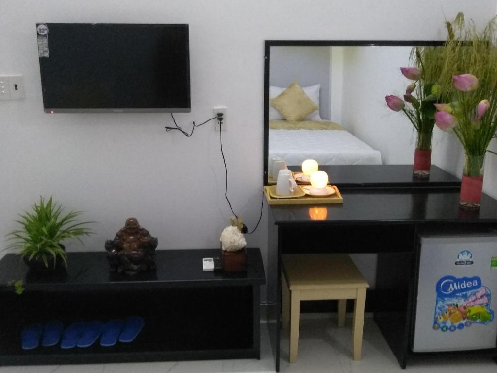 TV a/nebo společenská místnost v ubytování Phuc Hau Hotel