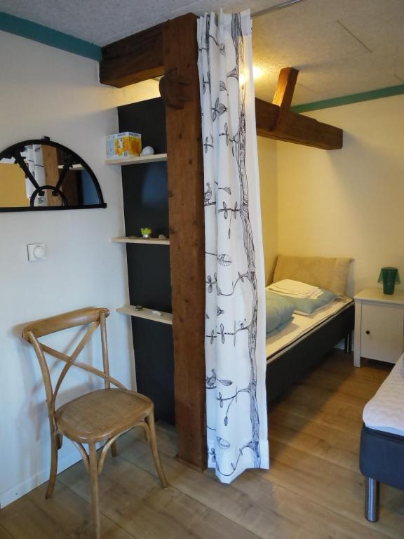 Postel nebo postele na pokoji v ubytování Nyager Apartments