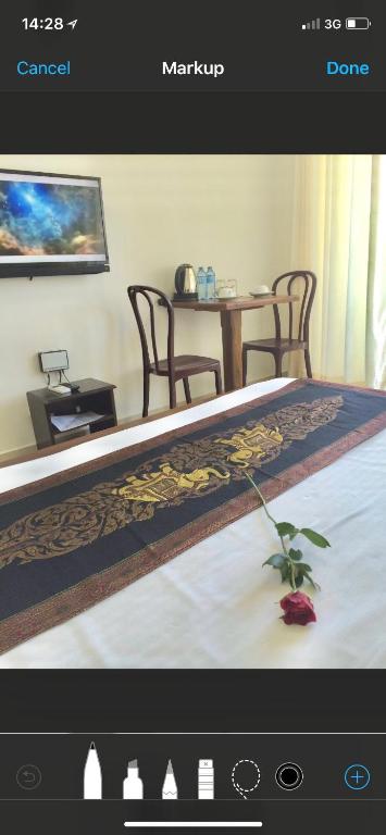 TV a/nebo společenská místnost v ubytování Kandy Supreme Hotel