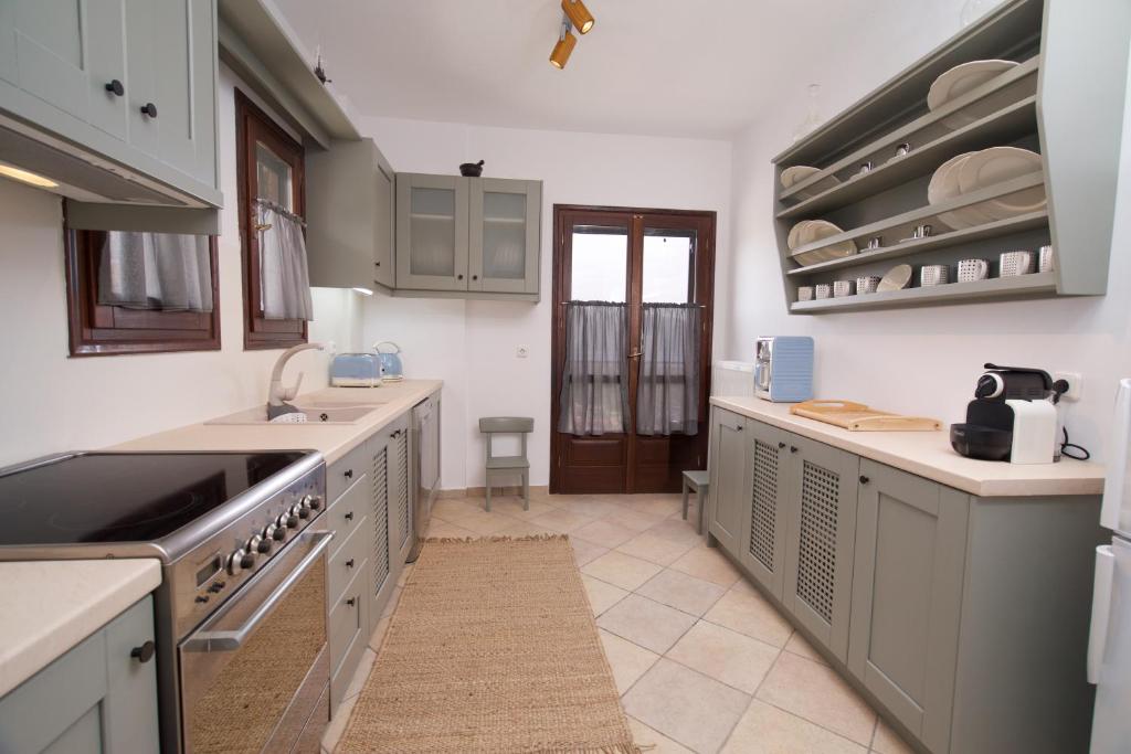 Kuchyň nebo kuchyňský kout v ubytování Tettix Summer House
