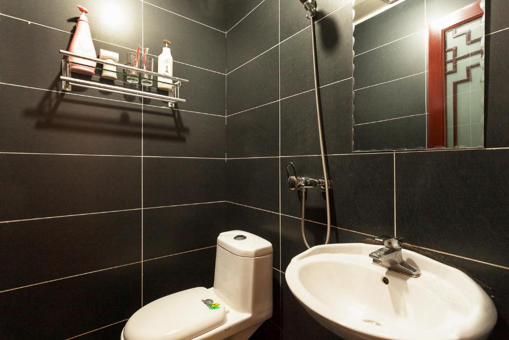 Koupelna v ubytování Pingyao Jiaxin Guesthouse
