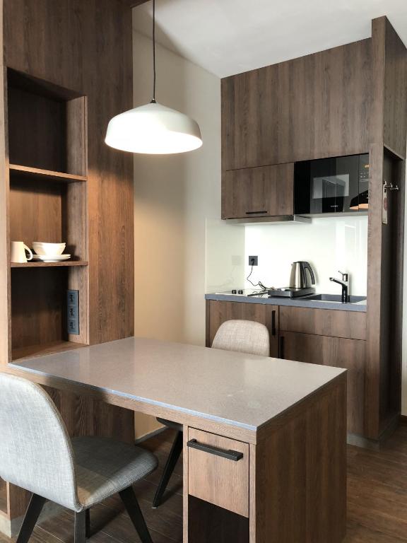 Kuchyň nebo kuchyňský kout v ubytování Hotel Smartino